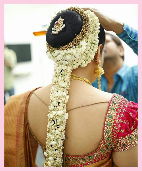 All Over Flowers bridal hairstyle for Indian Brides